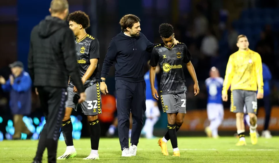 Russell Martin consoles his players after defeat to Gillingham in EFL