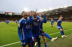 The Leicester City squad celebrating after scoring a decisive goal